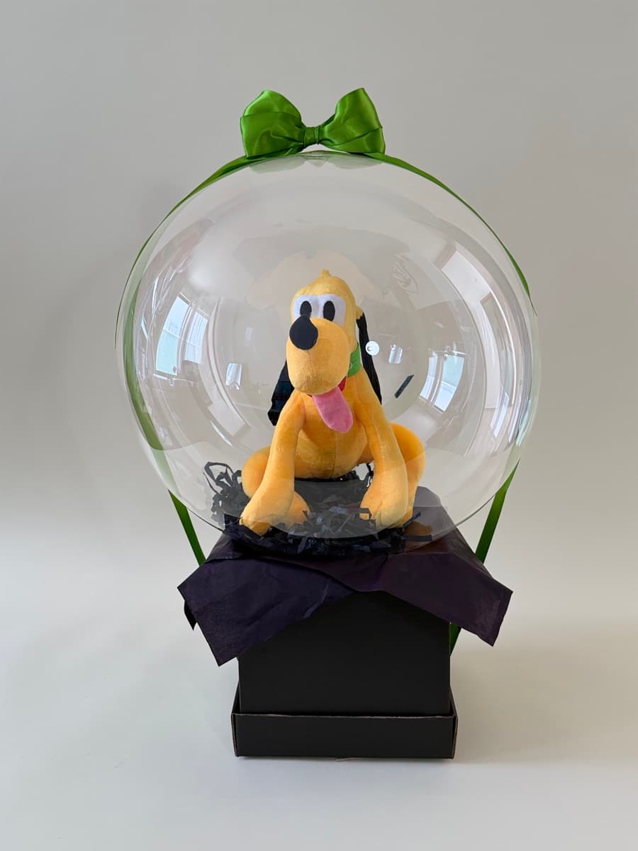 Peluche de Pluto en globo burbuja